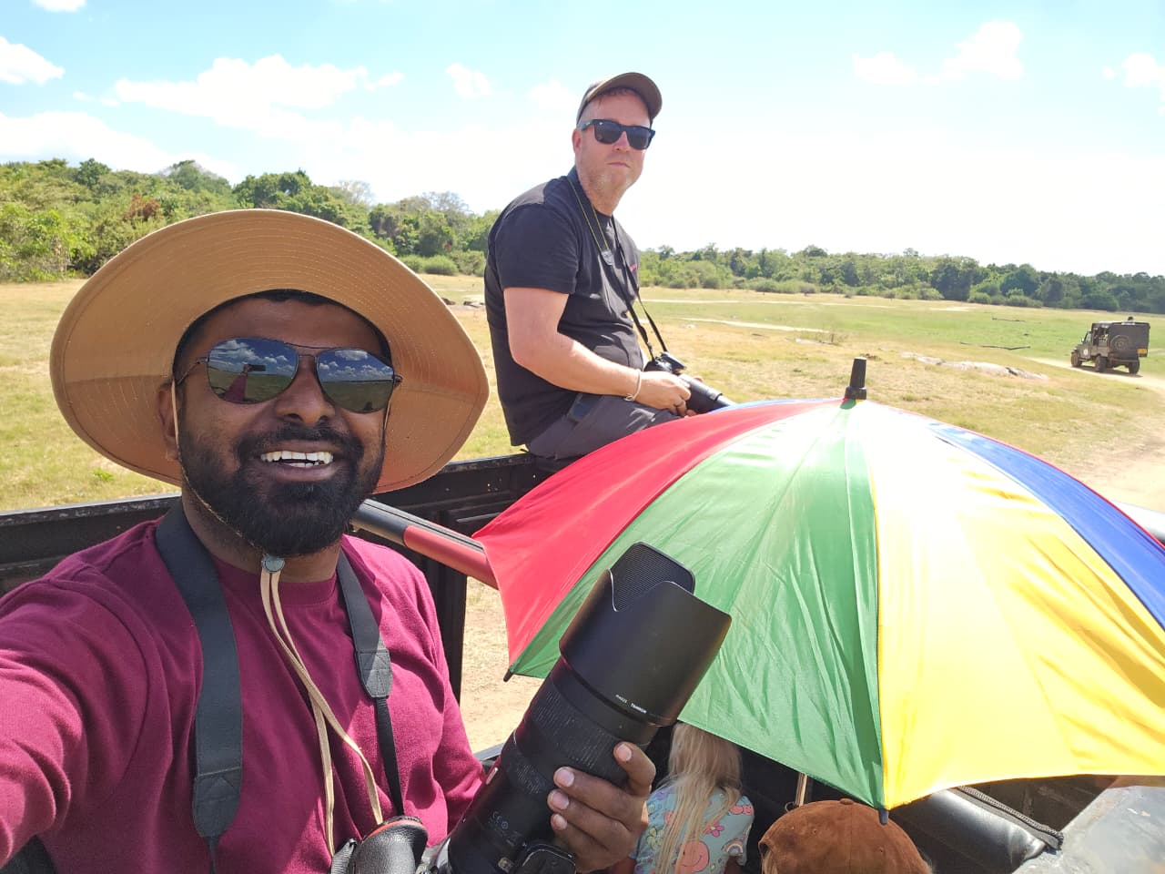 On safari, camera ready for the next sighting