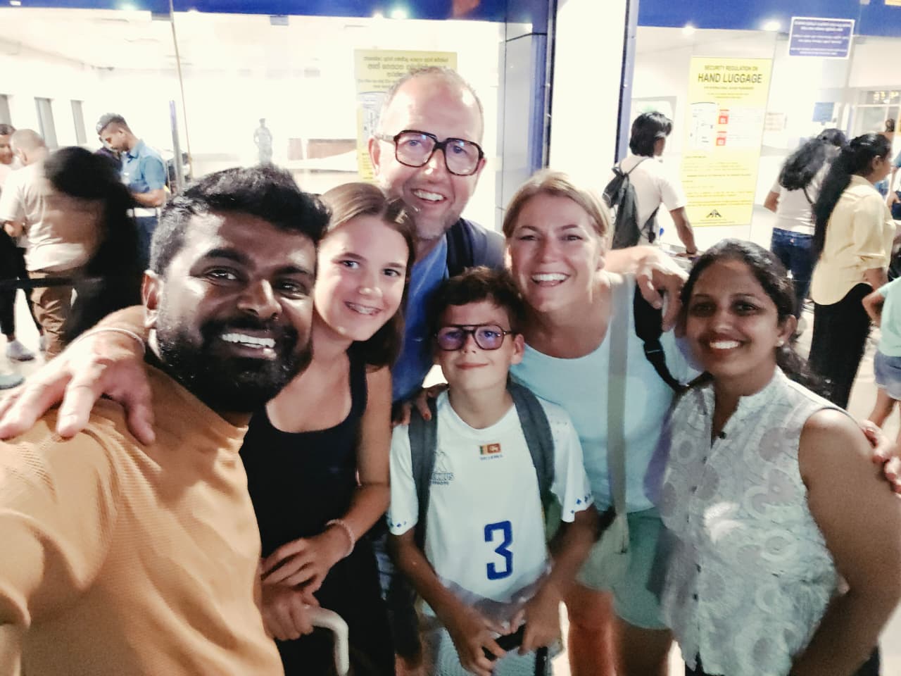 The family and Dhanuka together at the airport before departure