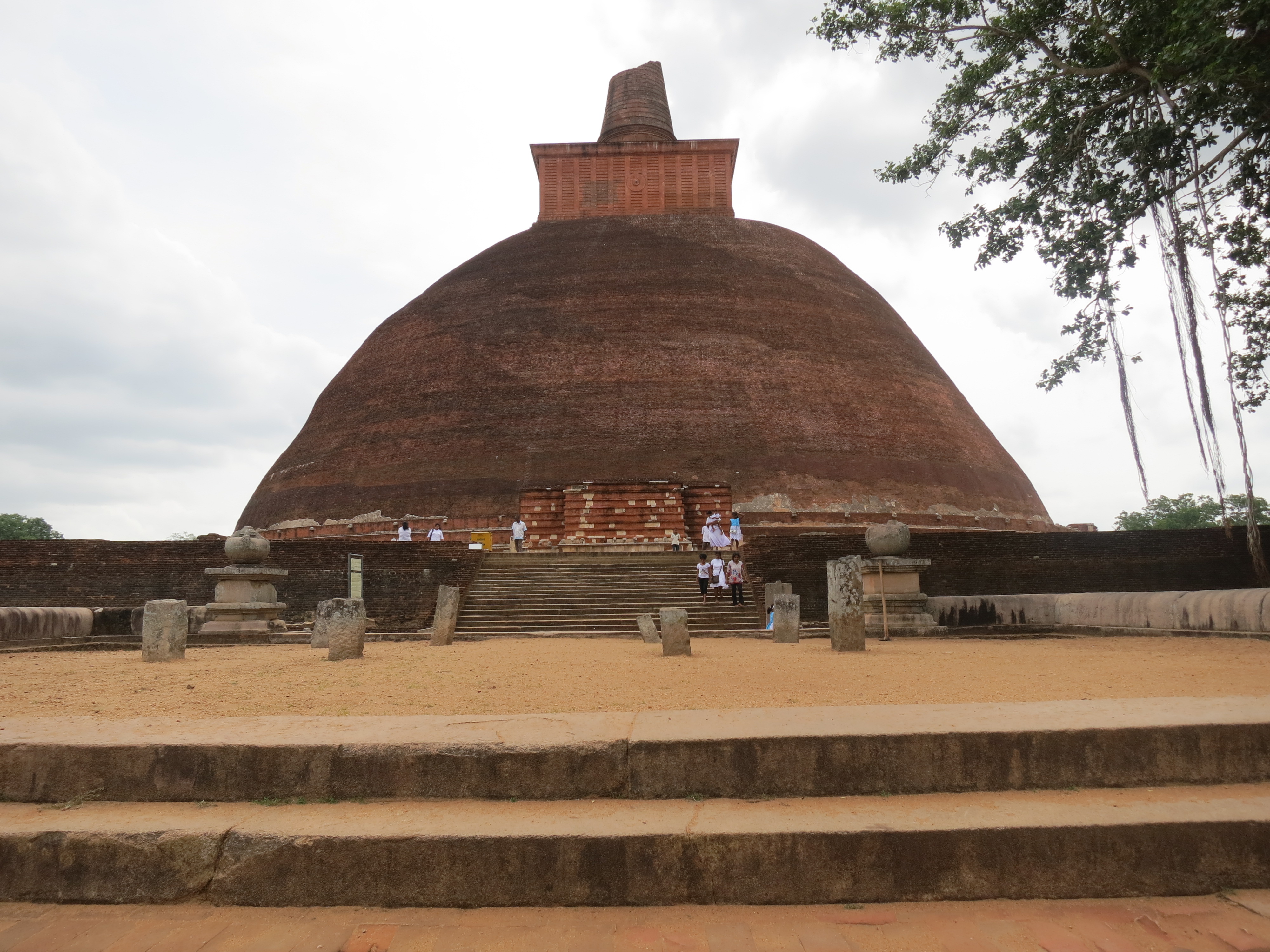 Side view of the Jethawanaramaya brick stupa above the trees
