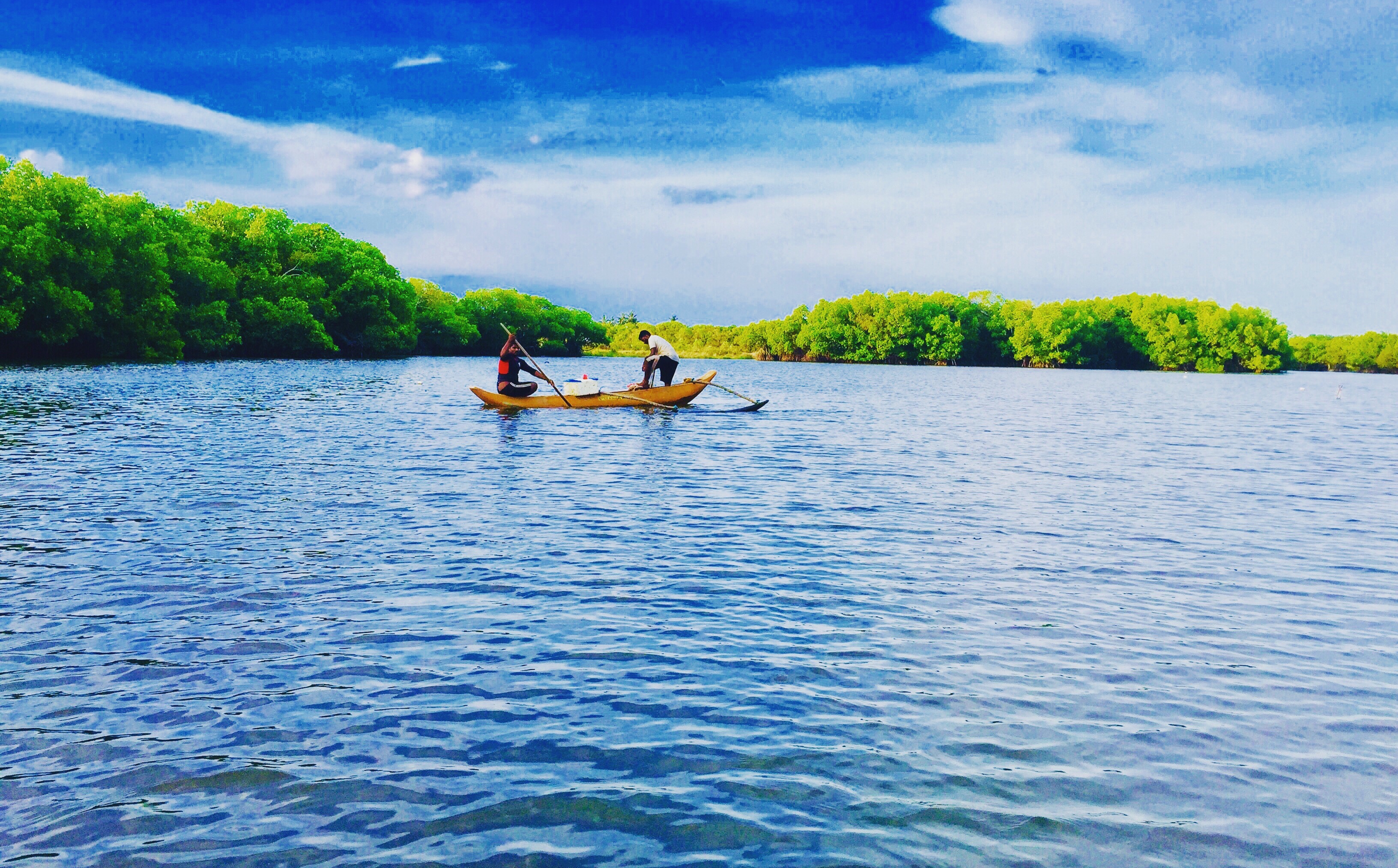Fishermen at work on the calm Pottuvil Lagoon