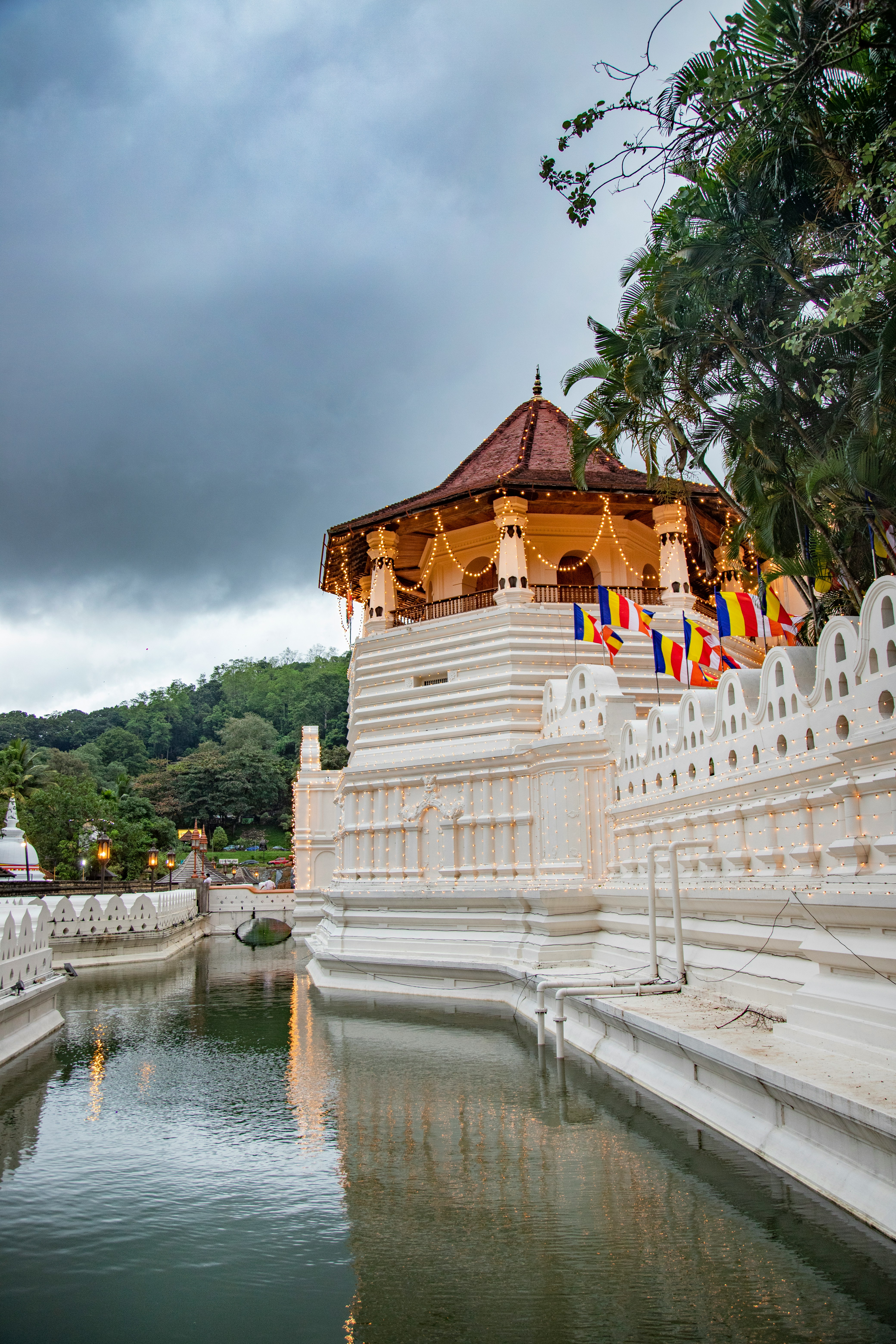 Temple of the Tooth in Kandy with surrounding water