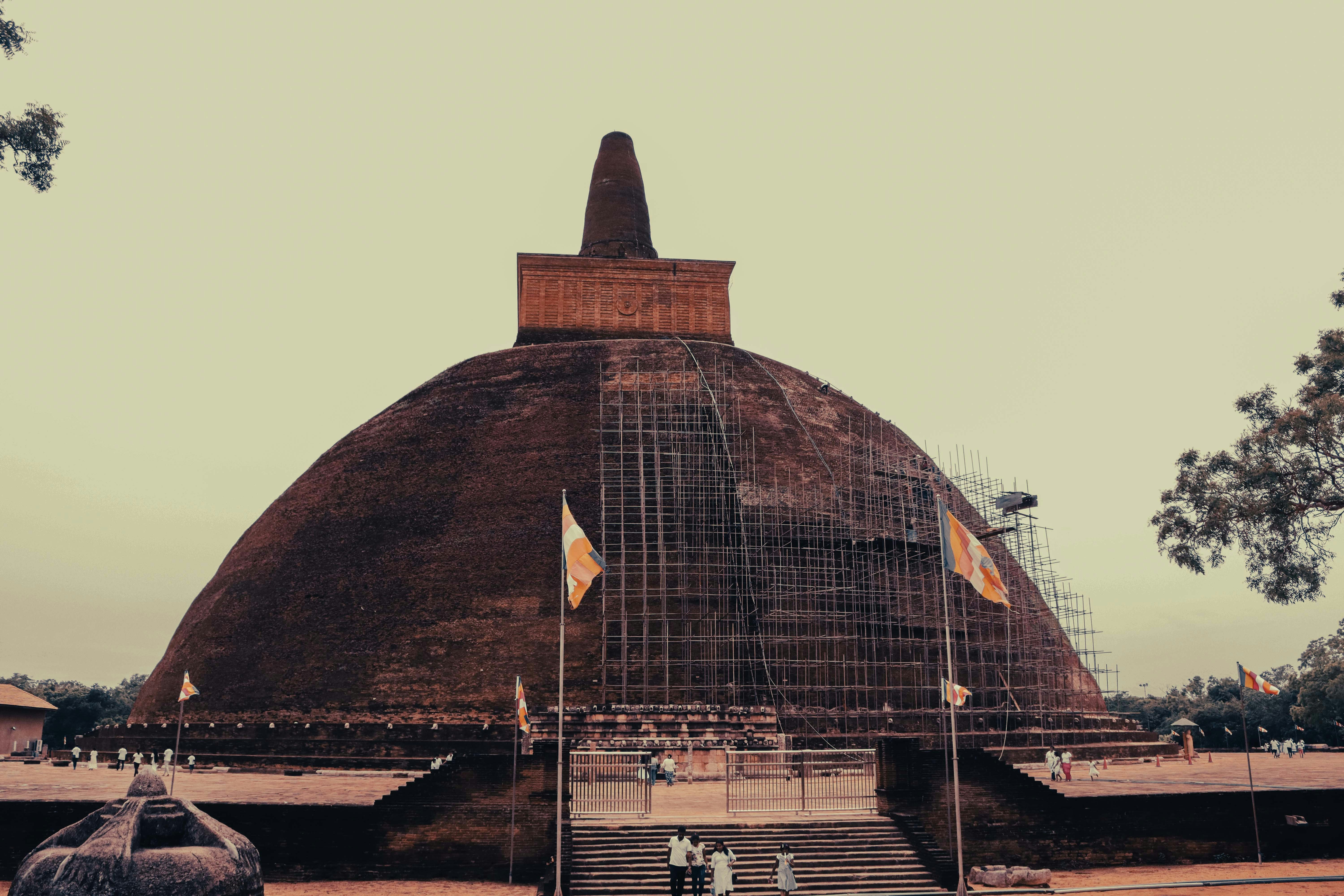 White stupa near a Sri Lankan lake